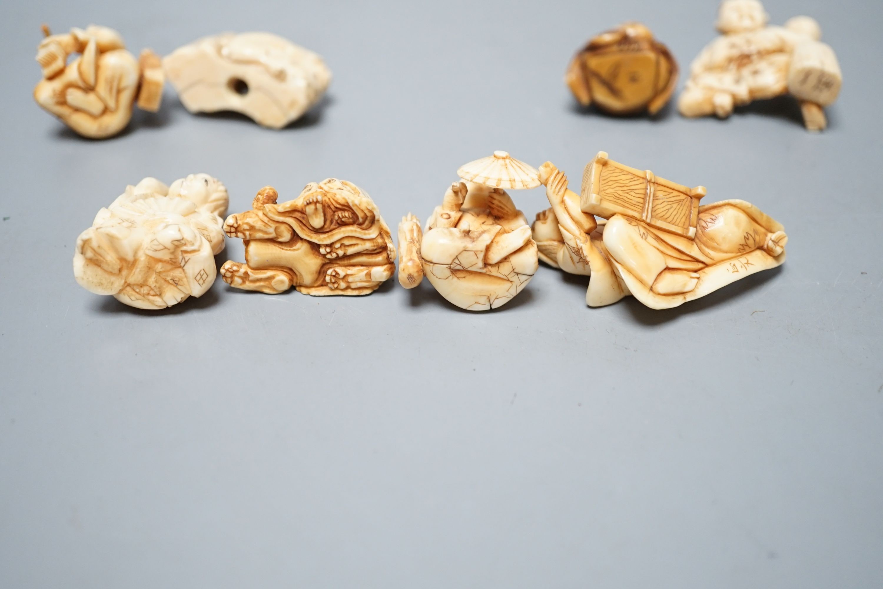 A collection of eight Japanese Ivory and bone Netsuke and okimono, 19th/early 20th century